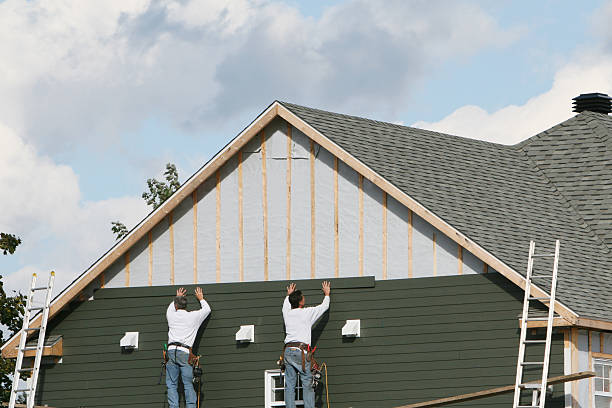 Professional Vinyl Siding technician working in Kenly, NC